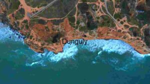 Aerial View of Rugged Coastal Cliffs and Ocean Waves