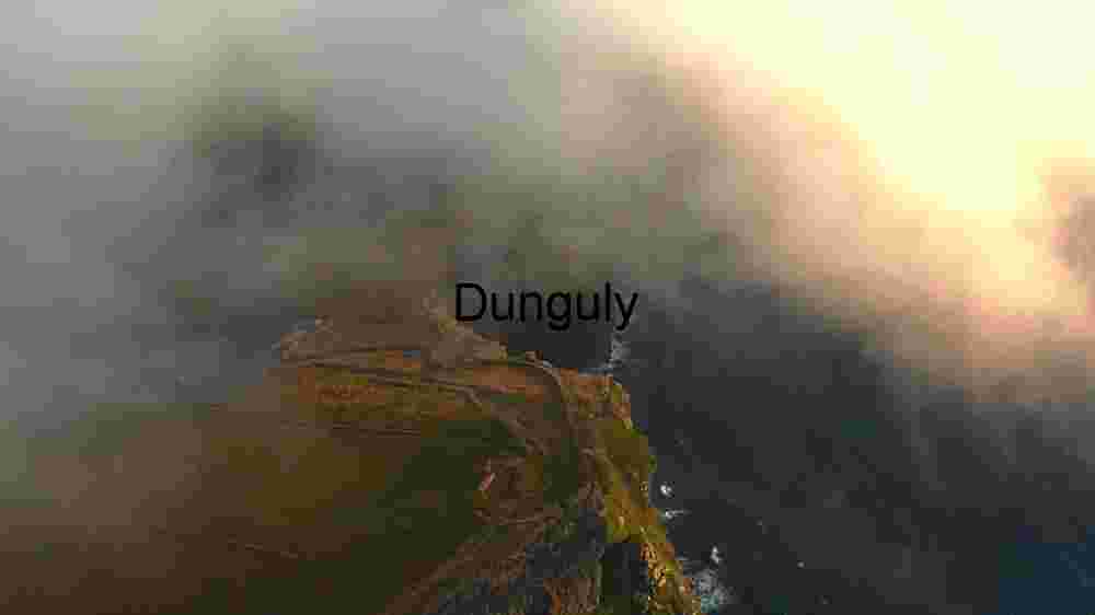 Misty Coastal Cliffs at Sunrise