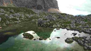 Alpine Mountain Reflection in a Rocky Pond