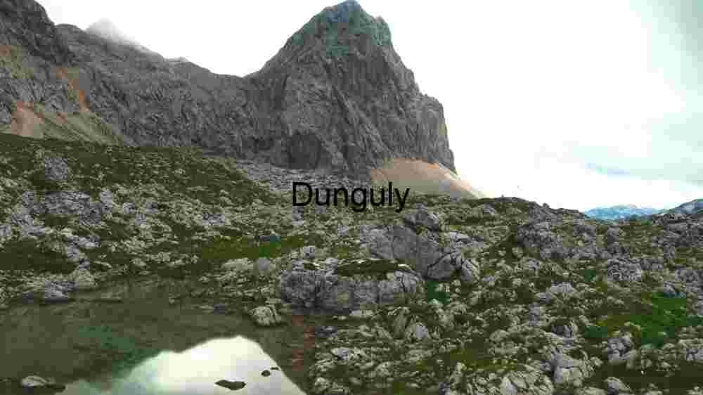 Majestic Mountain Landscape with Reflective Pond