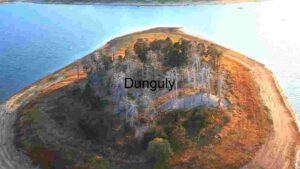 Aerial View of a Small Forested Colourful Island