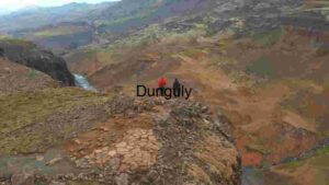 Aerial View of Verdant Landscape with Roads and Structures