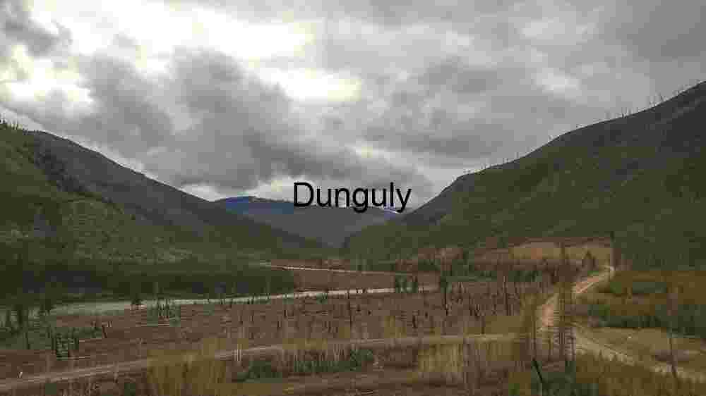 Serene Mountain Valley with River and Cloudy Sky
