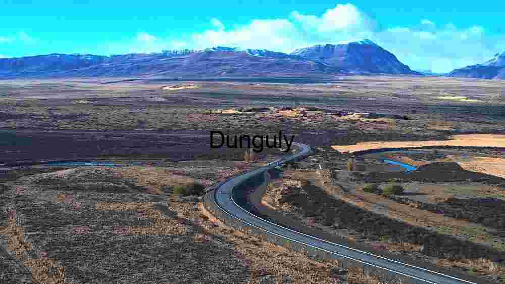 Serene Mountain Road with River and Vast Landscape