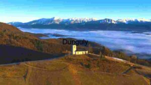 Serene Mountain Landscape with Church and Fog