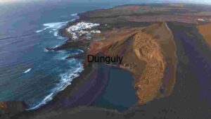 Aerial View of Coastal Town and Volcanic Landscape