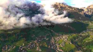 Aerial View of a Mountain Village with Clouds