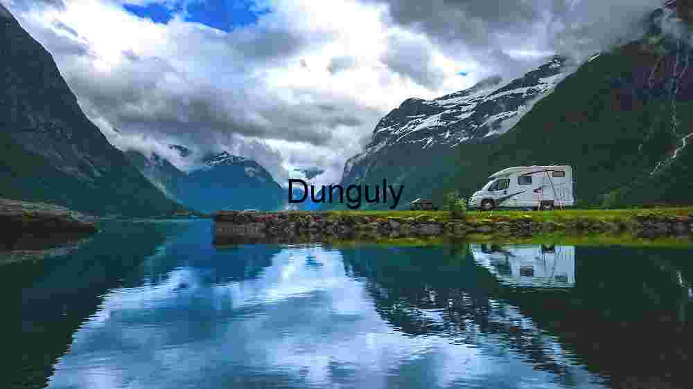 Serene Mountain Lake with Camper Van
