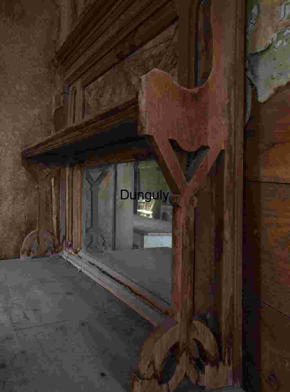 Antique Wooden Mirror Frame in Abandoned Room