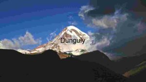 Majestic Snow-Capped Mountain Under a Dramatic Sky