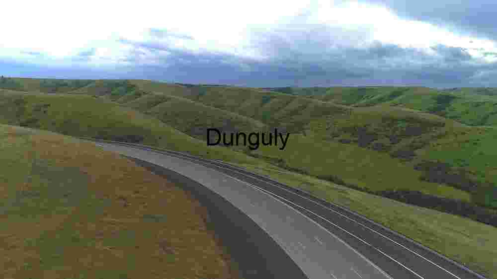 Scenic Highway Through Rolling Green Hills