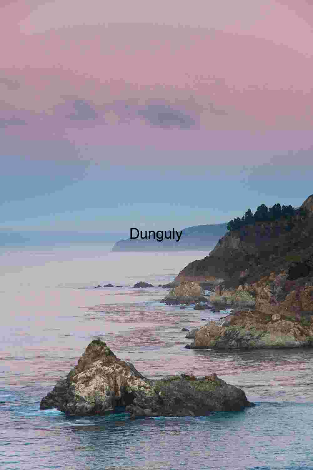 Coastal Sunset with Rocky Shoreline