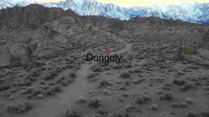 Lone Traveler in Rocky Desert Landscape