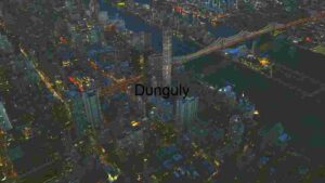 Aerial Night View of a City with Illuminated Bridge