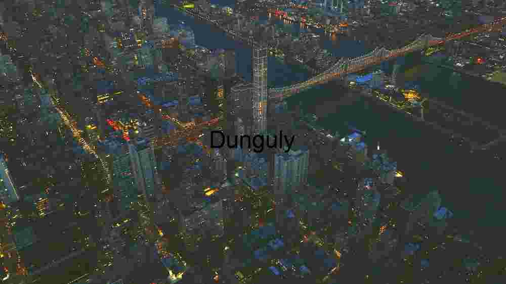 Aerial Night View of a City with Illuminated Bridge
