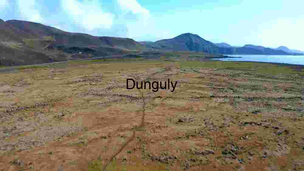 Rugged Landscape with Mountains and Coastline