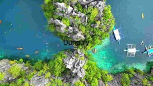 Kayakers and Swimmers in a Tropical Lagoon from above