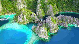 Aerial View of Limestone Cliffs and Turquoise Waters