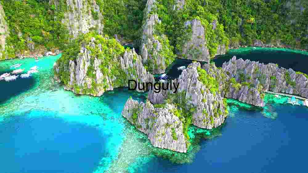 Aerial View of Limestone Cliffs and Turquoise Waters