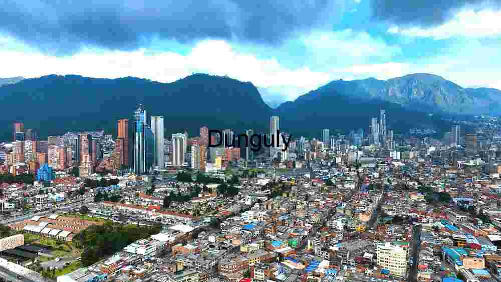 Aerial View of a Modern Urban Cityscape with Mountain Backdrop