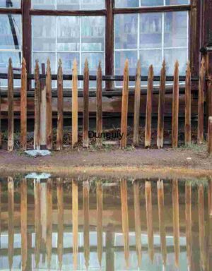 Rustic Fence Reflection in Front of Vintage Window