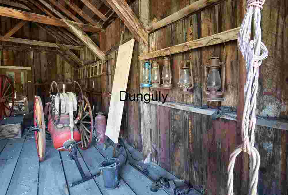 Vintage Barn Interior with Antique Equipment