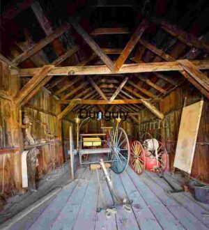 Rustic Barn Interior with Antique Equipment