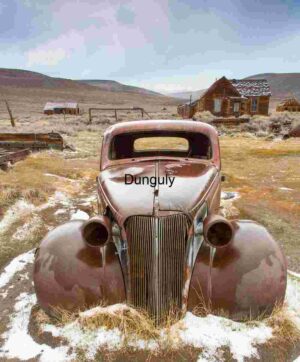Abandoned Vintage Car in a Deserted Ghost Town