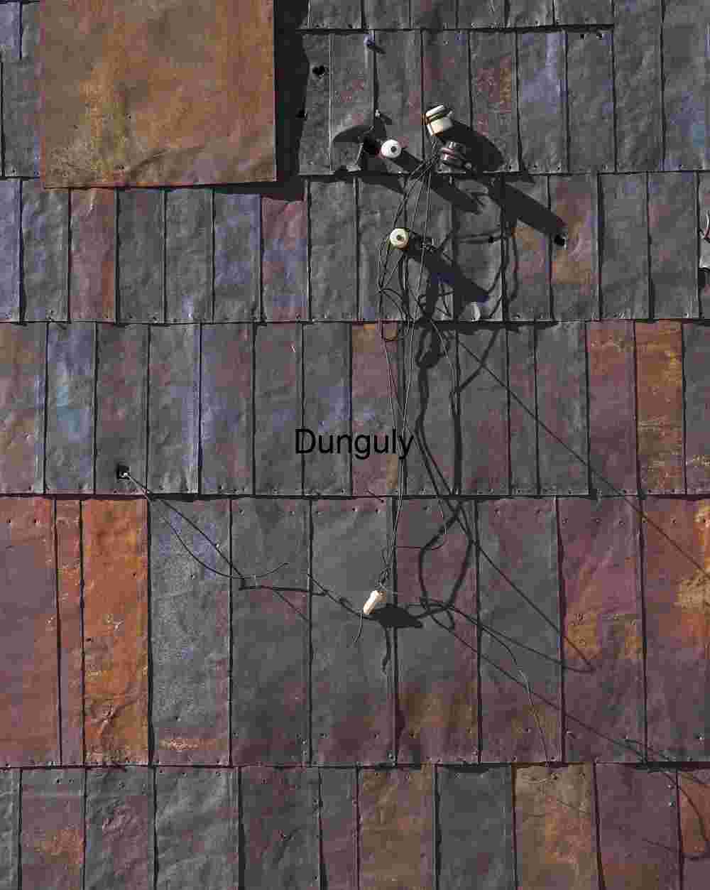 Weathered Metal Wall with Electrical Components