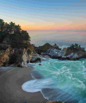 Serene Coastal Waterfall at Sunset