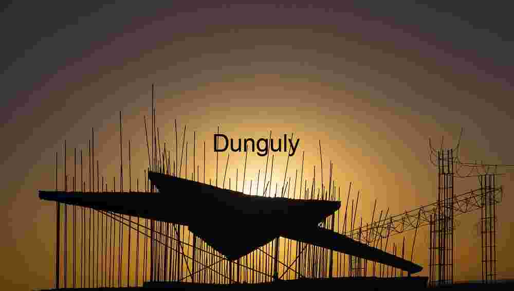 Sunset Silhouettes Over Emerging Construction Framework