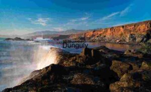 Crashing Waves and Sunlit Cliffs, Coastal California Drama