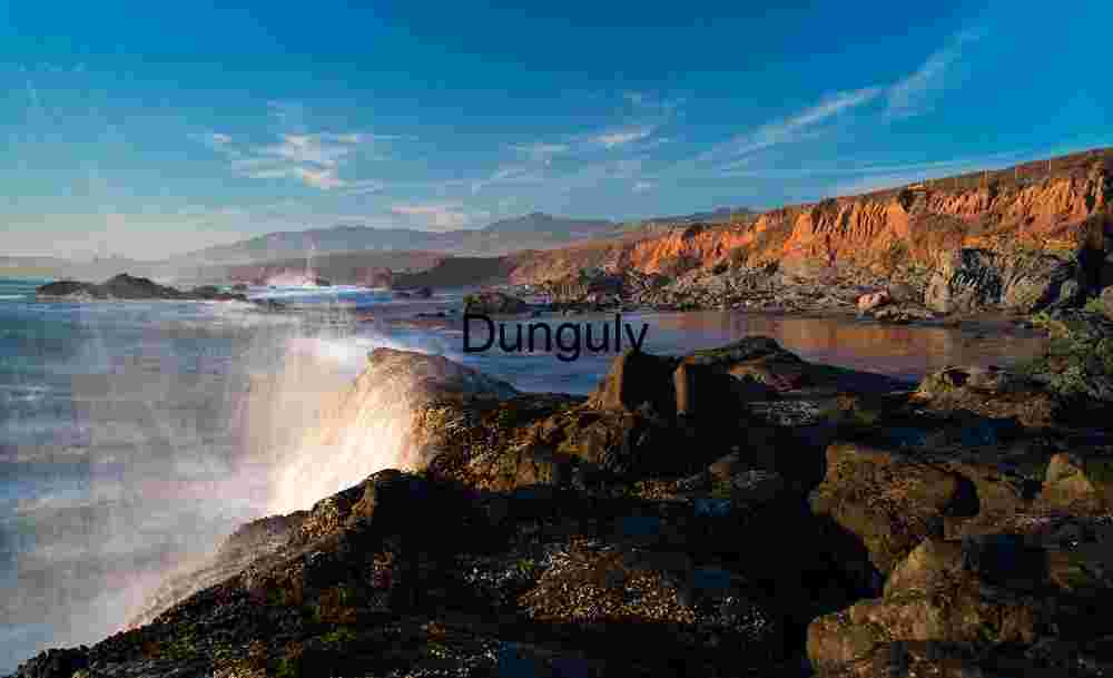 Crashing Waves and Sunlit Cliffs, Coastal California Drama