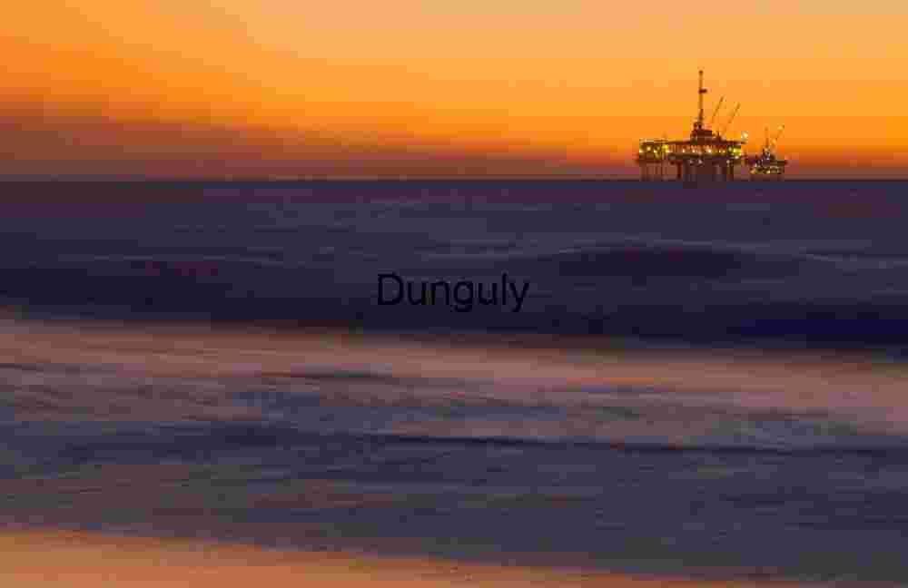 Sunset Sentinel: Offshore Oil Platform Amid Tranquil Waters