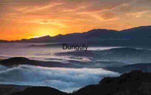 Veil of Light: Sunrise Mist Over Mountain Valleys