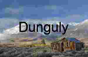 Rustic Shack in Autumn Grassland with Snow‑Capped Mountains