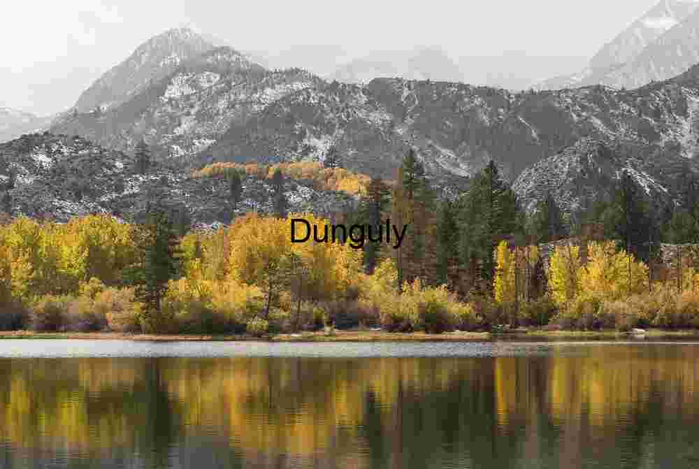 Autumn Forest and Snow‑Dusted Mountains Reflected in Calm Lake