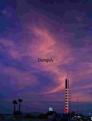 Desert Heat Rising: Iconic Thermometer Under a Fiery Sky