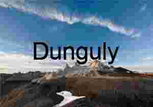 Eroded Desert Formations Under Vast Blue Sky