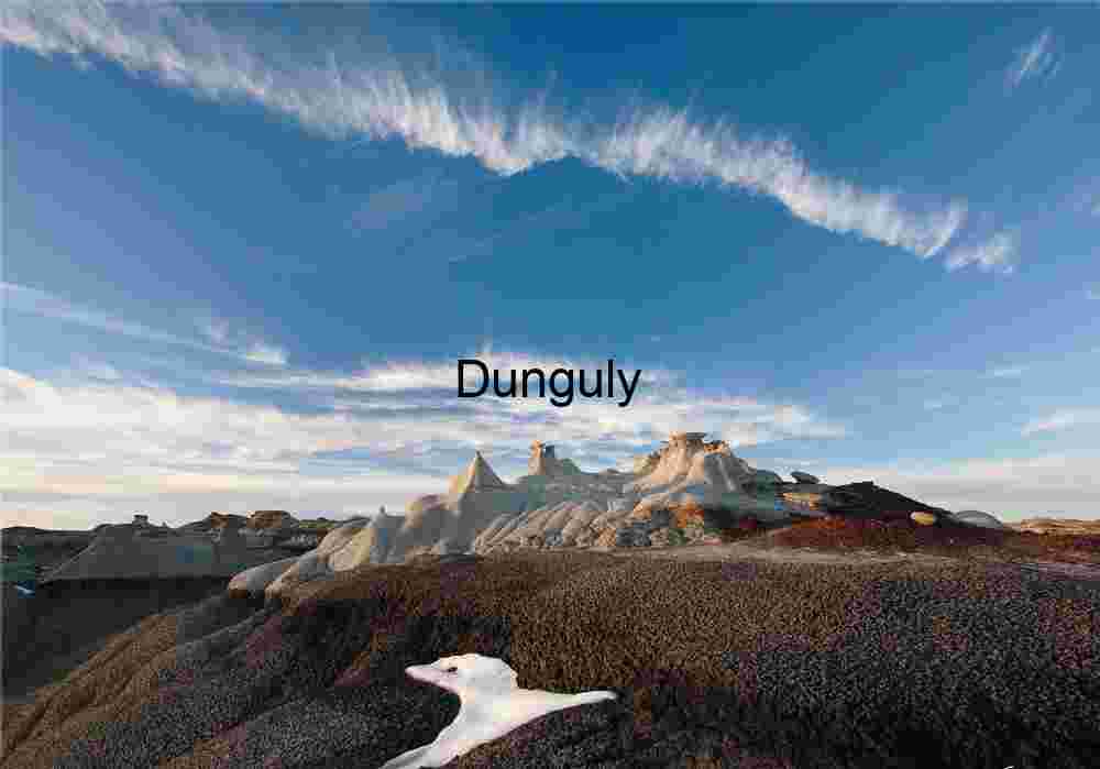 Eroded Desert Formations Under Vast Blue Sky
