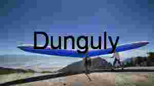 Adventure Sports in Mid‑Air — Hang Glider Silhouette Against Horizon