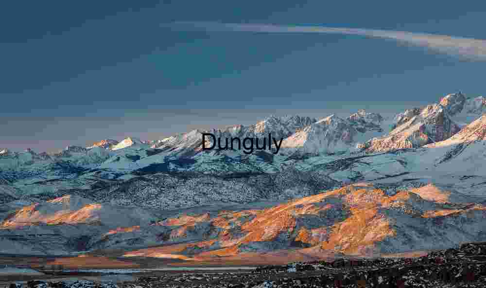 Snow‑Capped Mountain Range Under Clear Blue Sky — Majestic Alpine Landscape