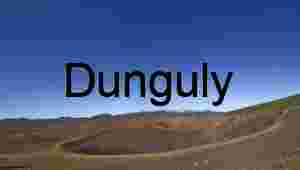 Crater and Crown: Volcanic Trail Beneath Snow-Capped Majesty