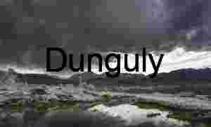 Stormfront Reflections: Salt Flat Pools Beneath Mountain Shadows