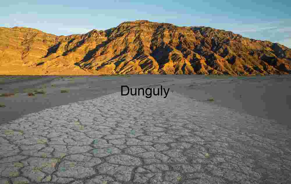 Cracked Silence: Salt Pan and Sunlit Peaks