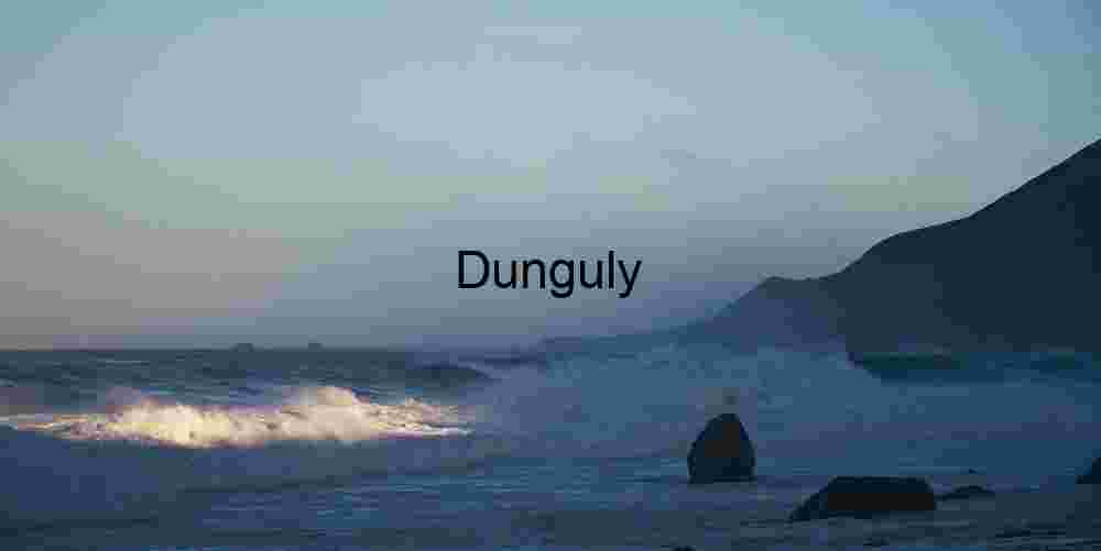 Dynamic Coastal Dawn: Waves Crashing on Rocky Shore