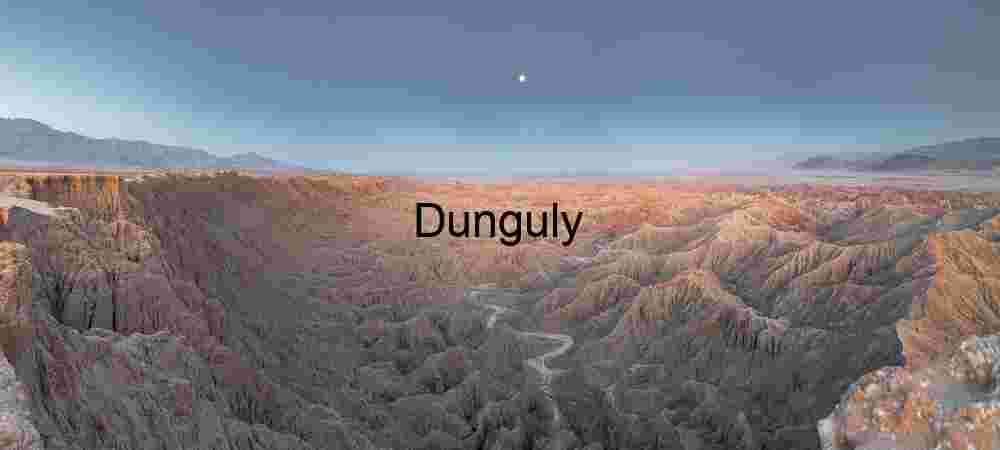 Eroded Desert Badlands Under Twilight Moonlight