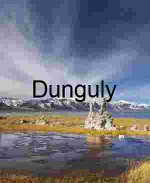 Frozen Mono Lake Tufa Towers with Sierra Nevada Mountains under Blue Sky
