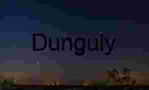 Night Sky with Bright Planets and Stars over Horizon Lights