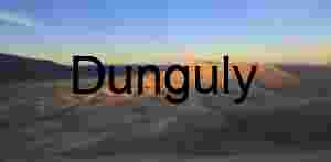 Sunlit Desert Dunes and Mountain Horizon at Golden Hour